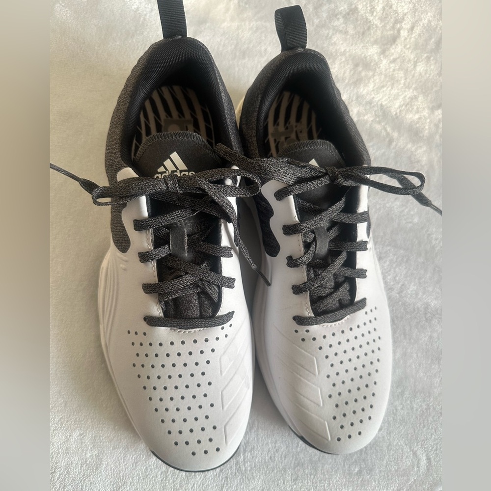 Men’s Adidas size 10 golf shoes. Worn once. White & gray